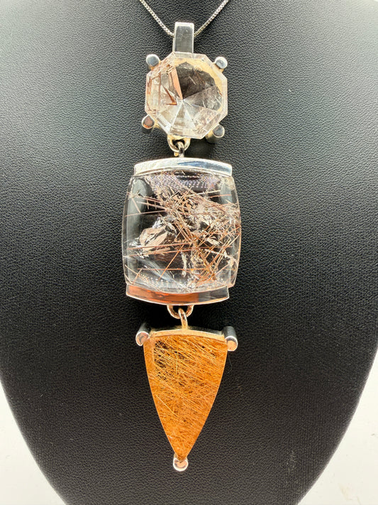 Rainbow Rutile in Quartz Pendants