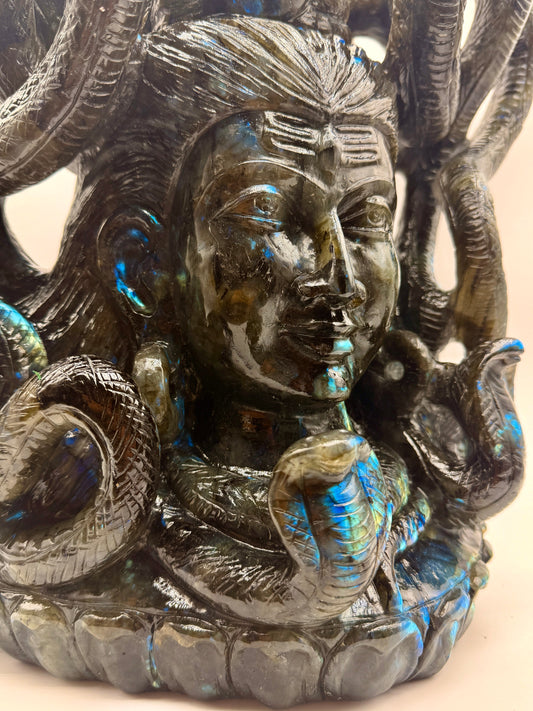Hand-carved natural Crystal Shiva statue displayed on a sacred crystal altar with collector-quality gemstone craftsmanship.