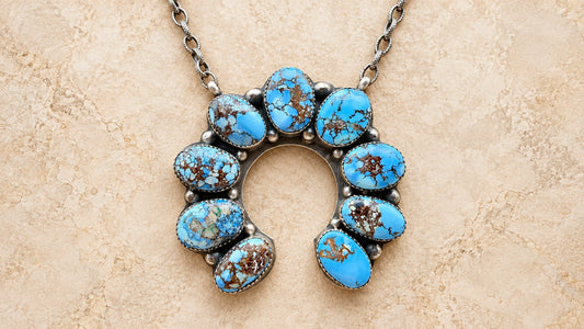 Golden Hills turquoise Naja necklace with nine blue matrix stones set in handcrafted sterling silver