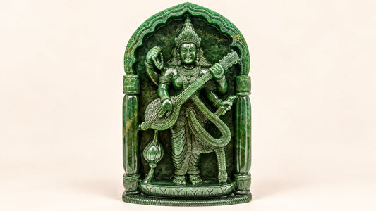 Hand-carved crystal Saraswati statue with veena representing knowledge, wisdom, music and creativity