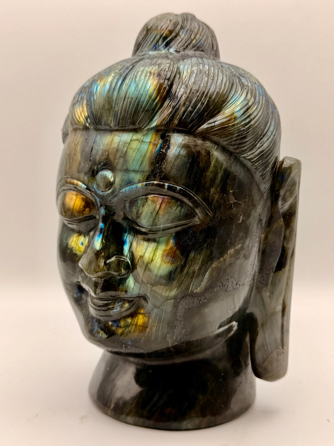 Hand-carved crystal Buddha statue symbolizing mindfulness, wisdom, compassion, and inner peace
