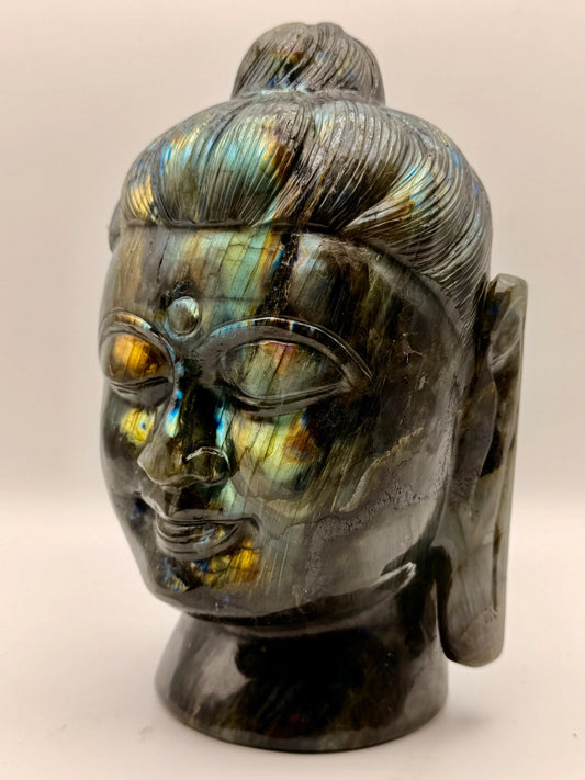 Hand-carved crystal Buddha statue symbolizing mindfulness, wisdom, compassion, and inner peace