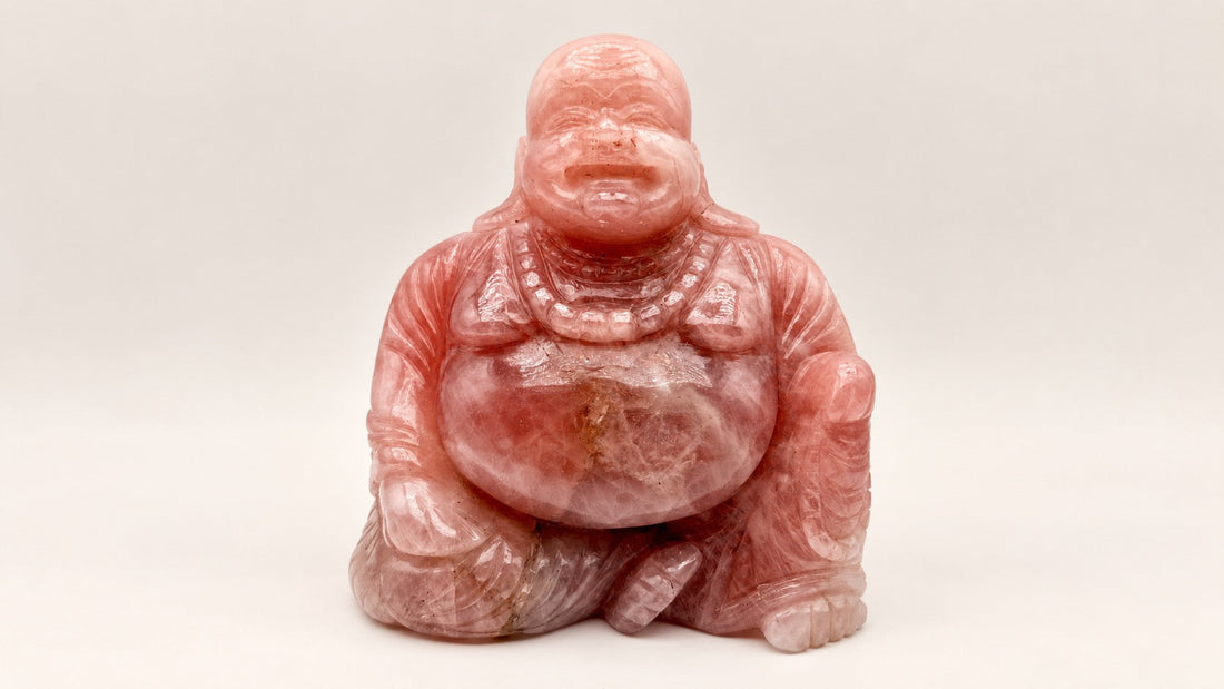 rose-quartz-laughing-buddha-crystal-statue.jpg