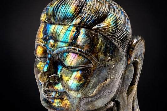 Hand-carved crystal Buddha statue symbolizing mindfulness, wisdom, compassion, and inner peace