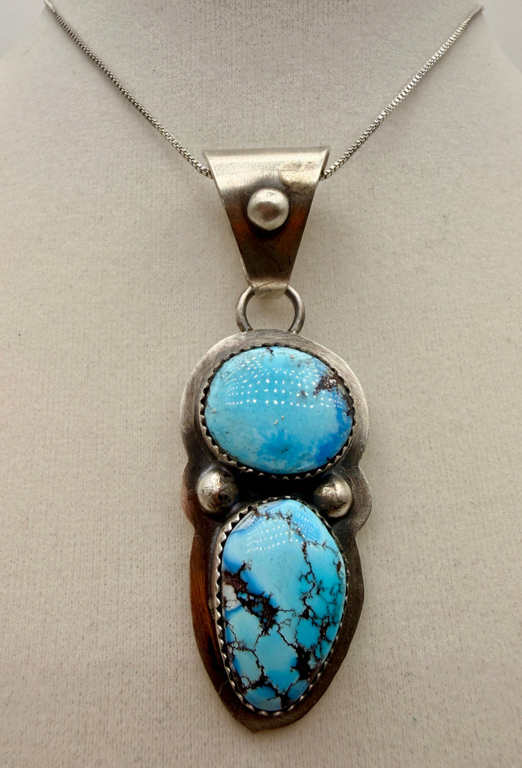 Dilbert Secatero two-stone Golden Hills turquoise sterling silver pendant shown from the front