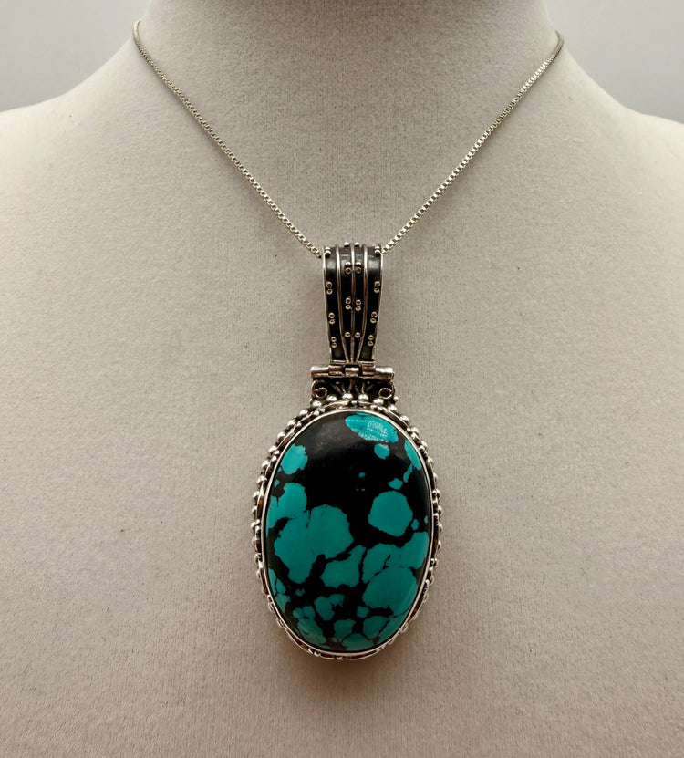 Authentic Hubei Turquoise sterling silver jewelry handcrafted by Native American artists at Lifted Realm.