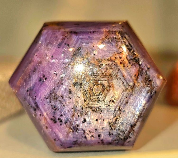 Natural purple star sapphire record keeper crystal from Mogok Myanmar with geometric growth formations and visible inclusions