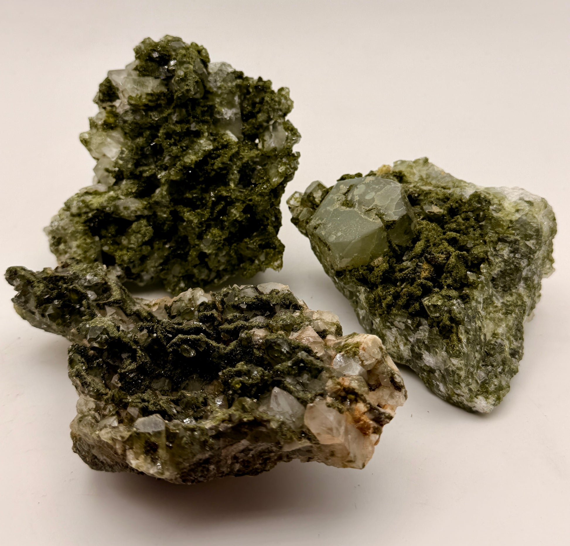 Natural Green Epidote on Quartz mineral specimens from Turkey featuring deep green epidote crystals on quartz matrix.