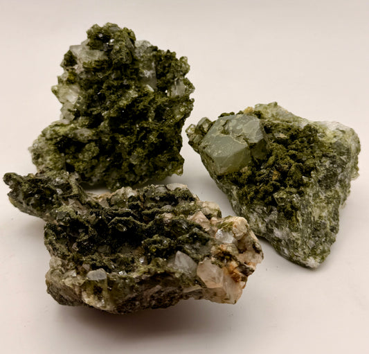 Natural Green Epidote on Quartz mineral specimens from Turkey featuring deep green epidote crystals on quartz matrix.