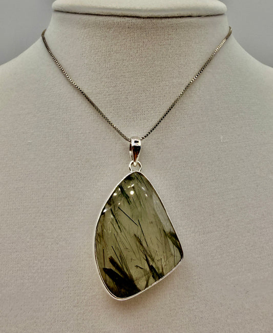 Actinolite in Quartz Pendants