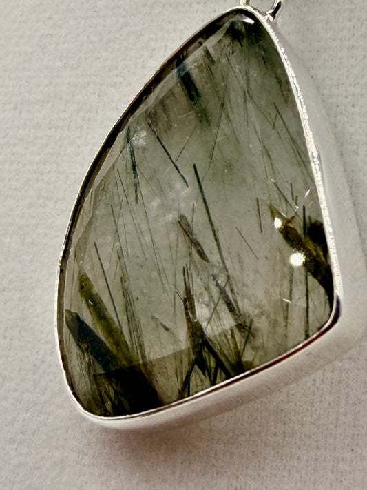 Actinolite in Quartz Pendants