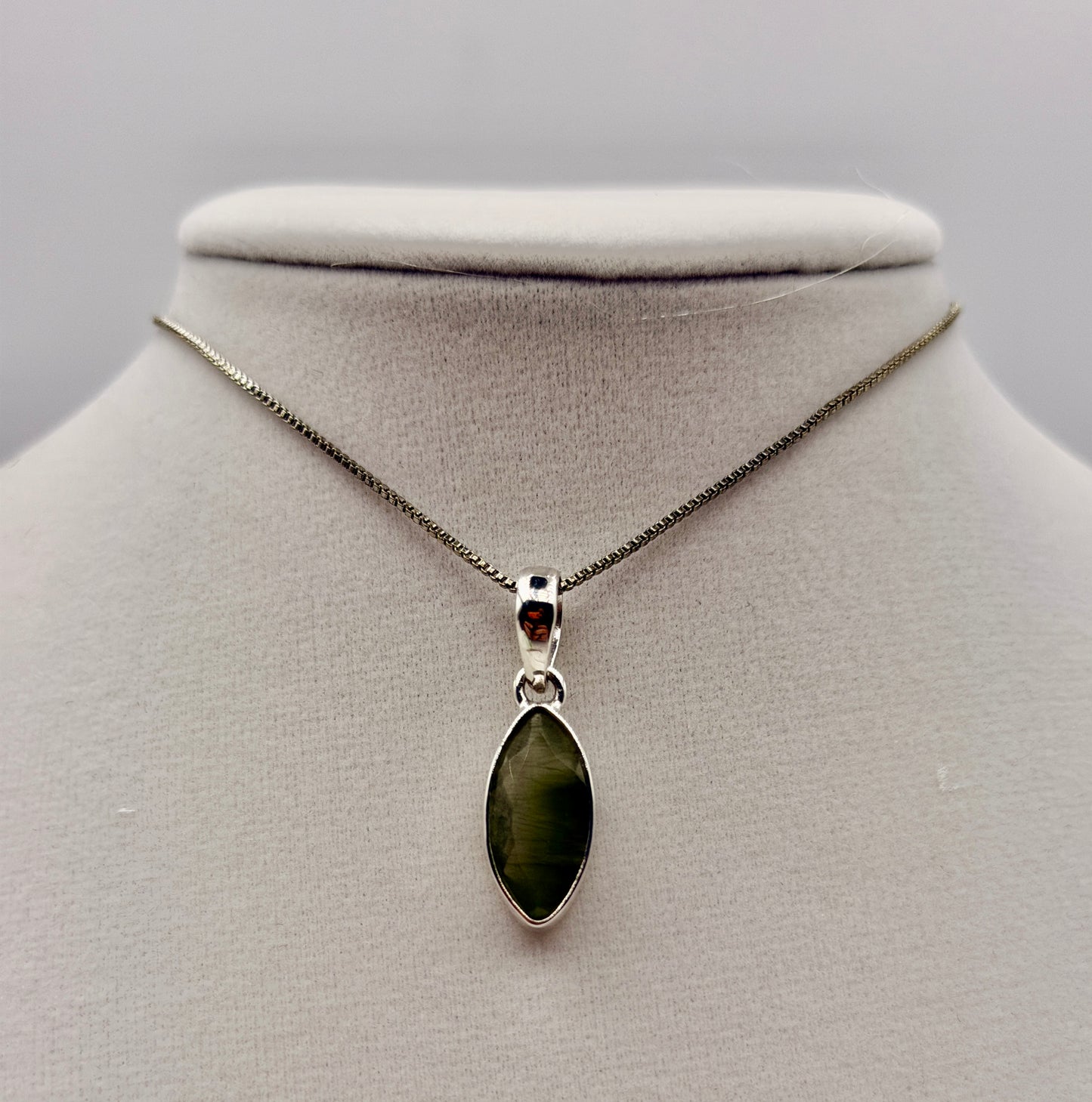 Actinolite in Quartz Pendants