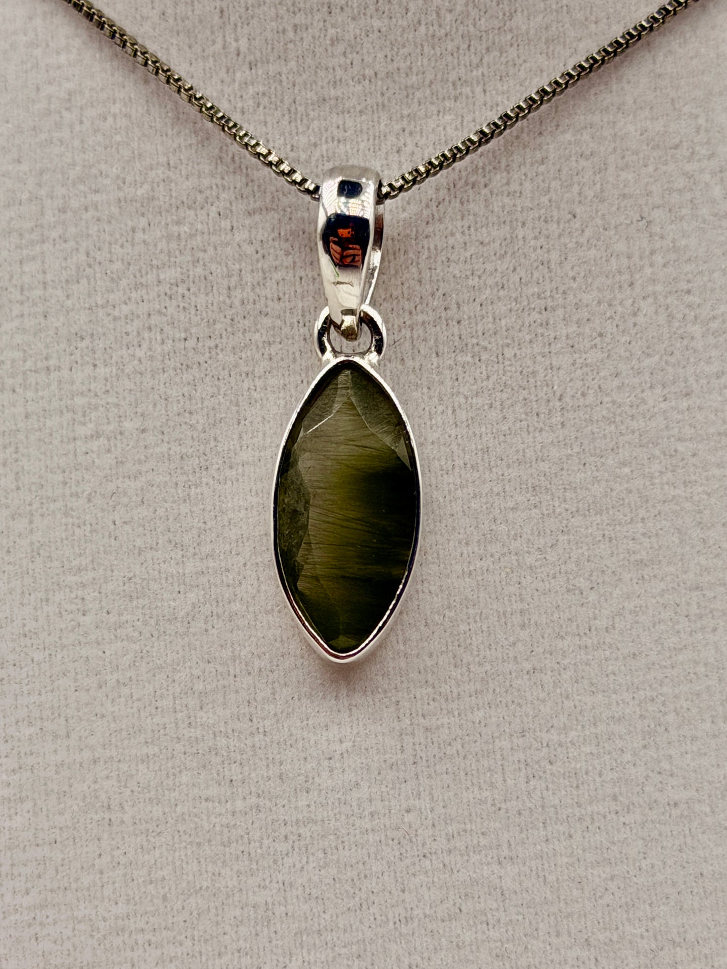Actinolite in Quartz Pendants