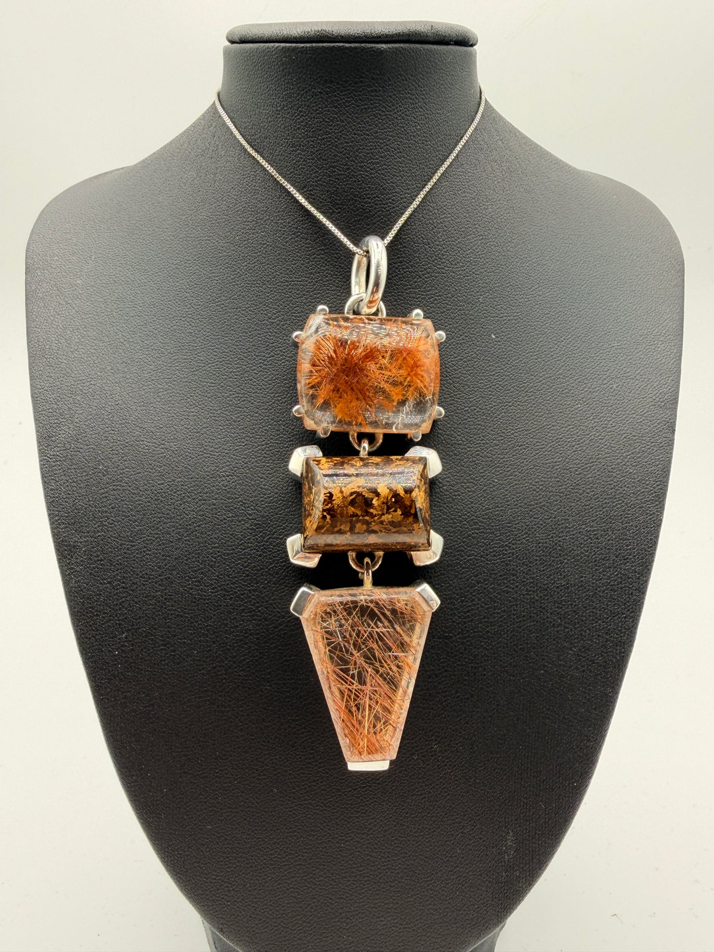 Rainbow Rutile in Quartz Pendants