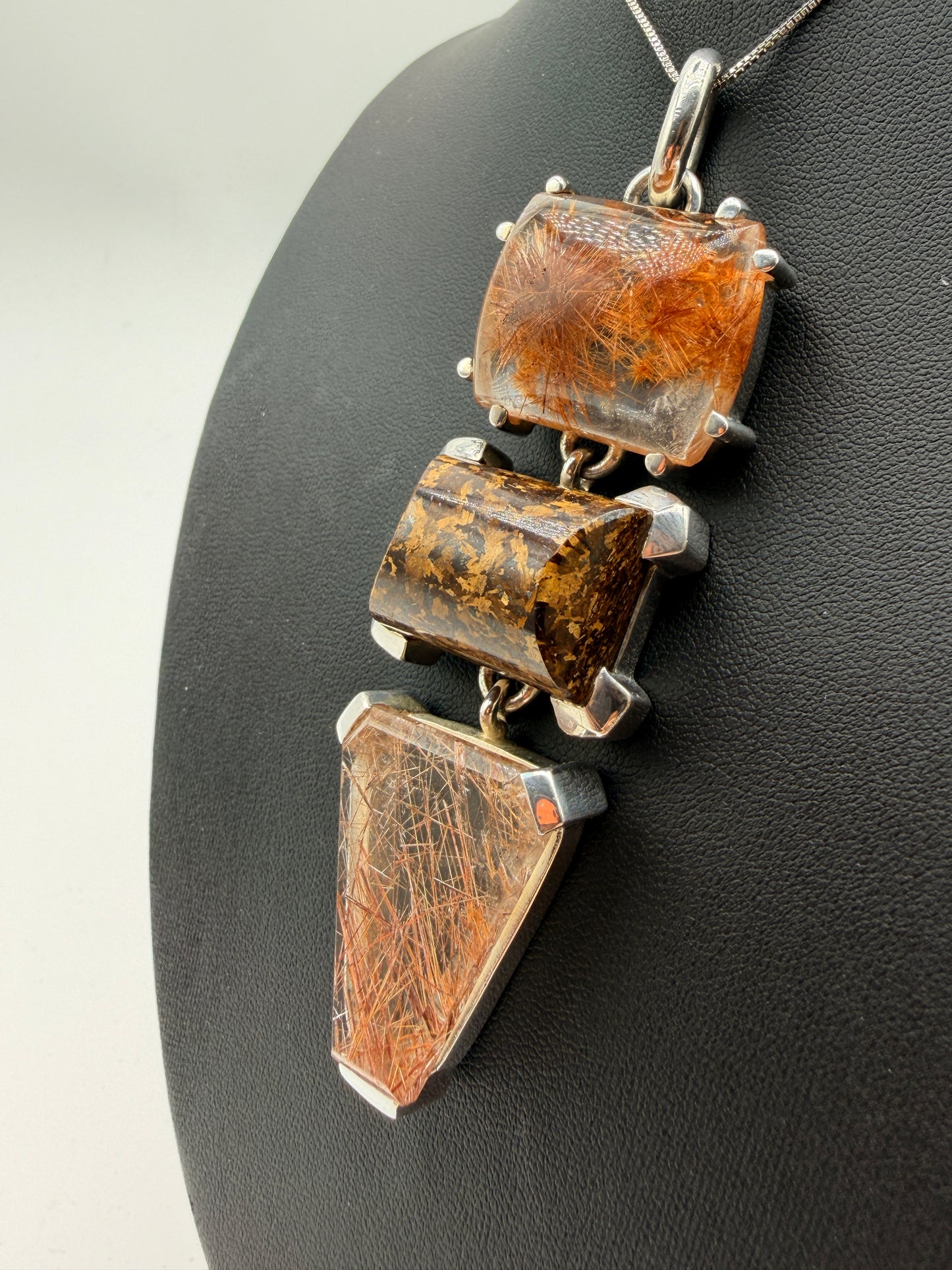 Rainbow Rutile in Quartz Pendants
