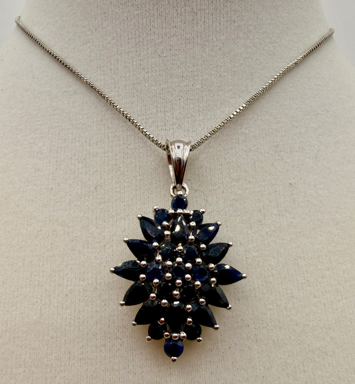 6.07 carat blue sapphire sterling silver floral gemstone pendant
