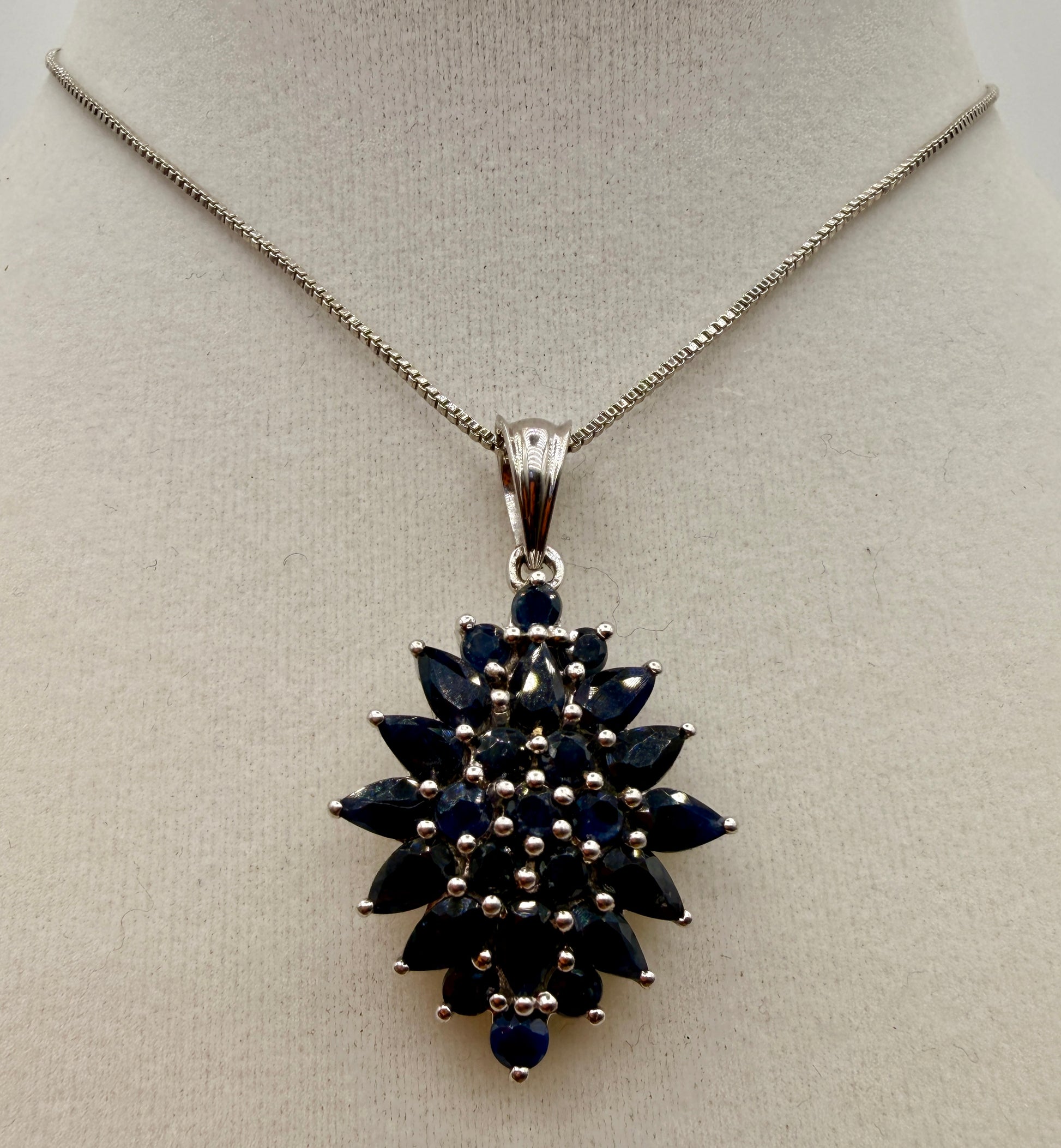 6.07 carat blue sapphire sterling silver floral gemstone pendant