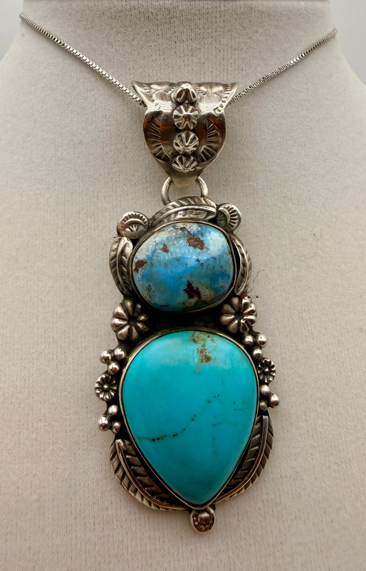 Golden Hills and Tyrone turquoise two-stone sterling silver pendant shown from the front