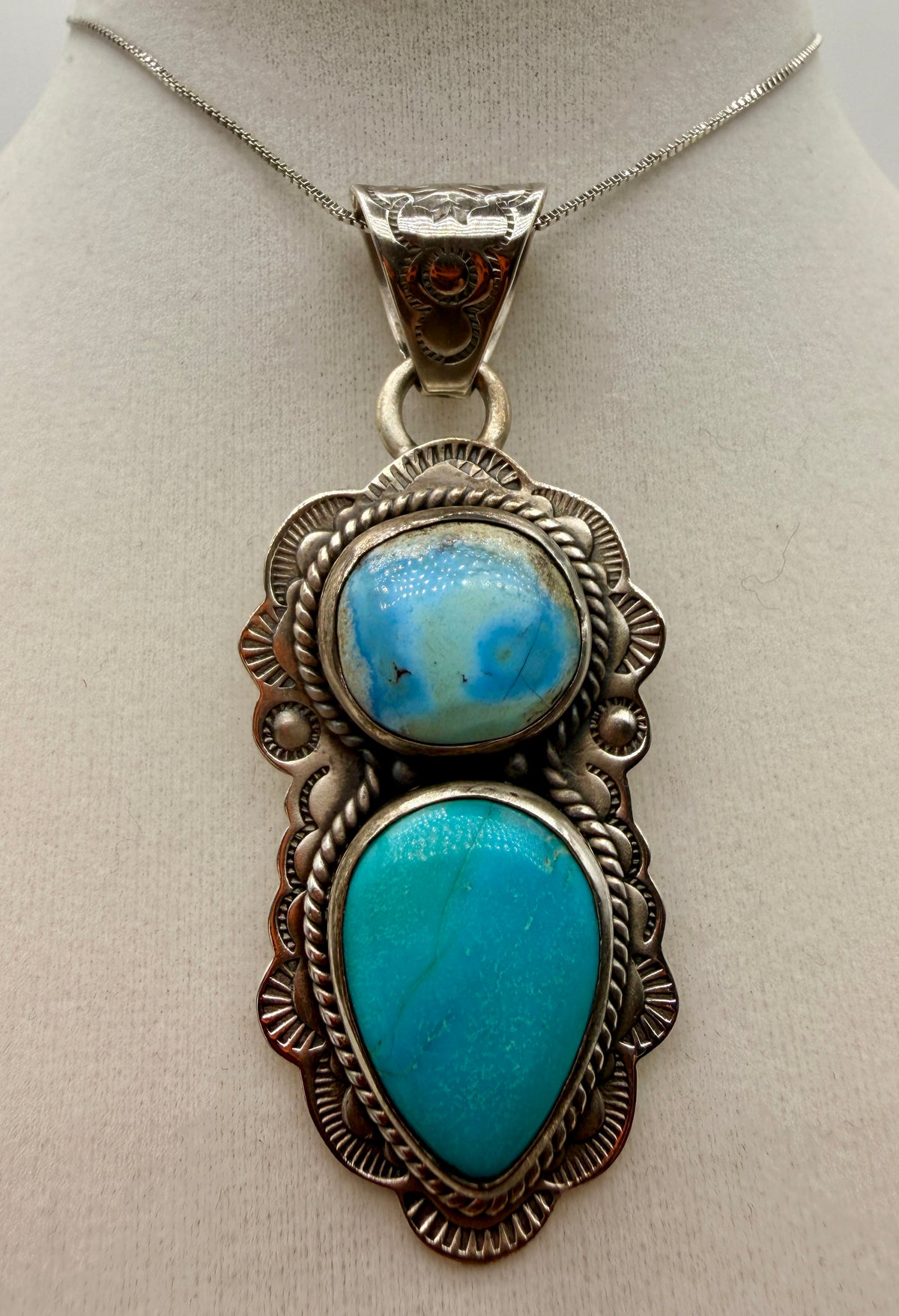 ZIA Golden Hills and Tyrone turquoise two-stone sterling silver pendant shown from the front