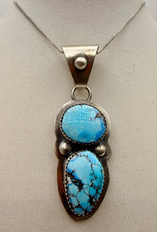 Dilbert Secatero two-stone Golden Hills turquoise sterling silver pendant shown from the front