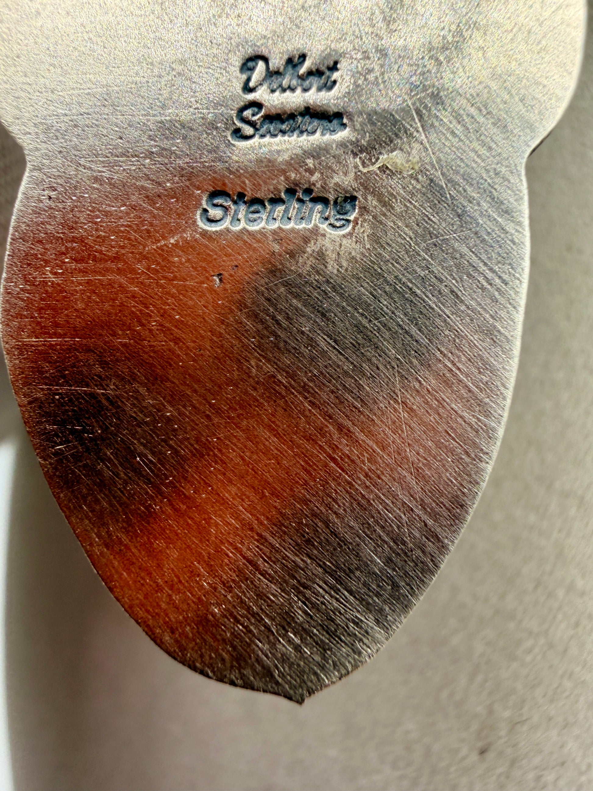Dilbert Secatero artist hallmark and Sterling stamp on the back of the pendant