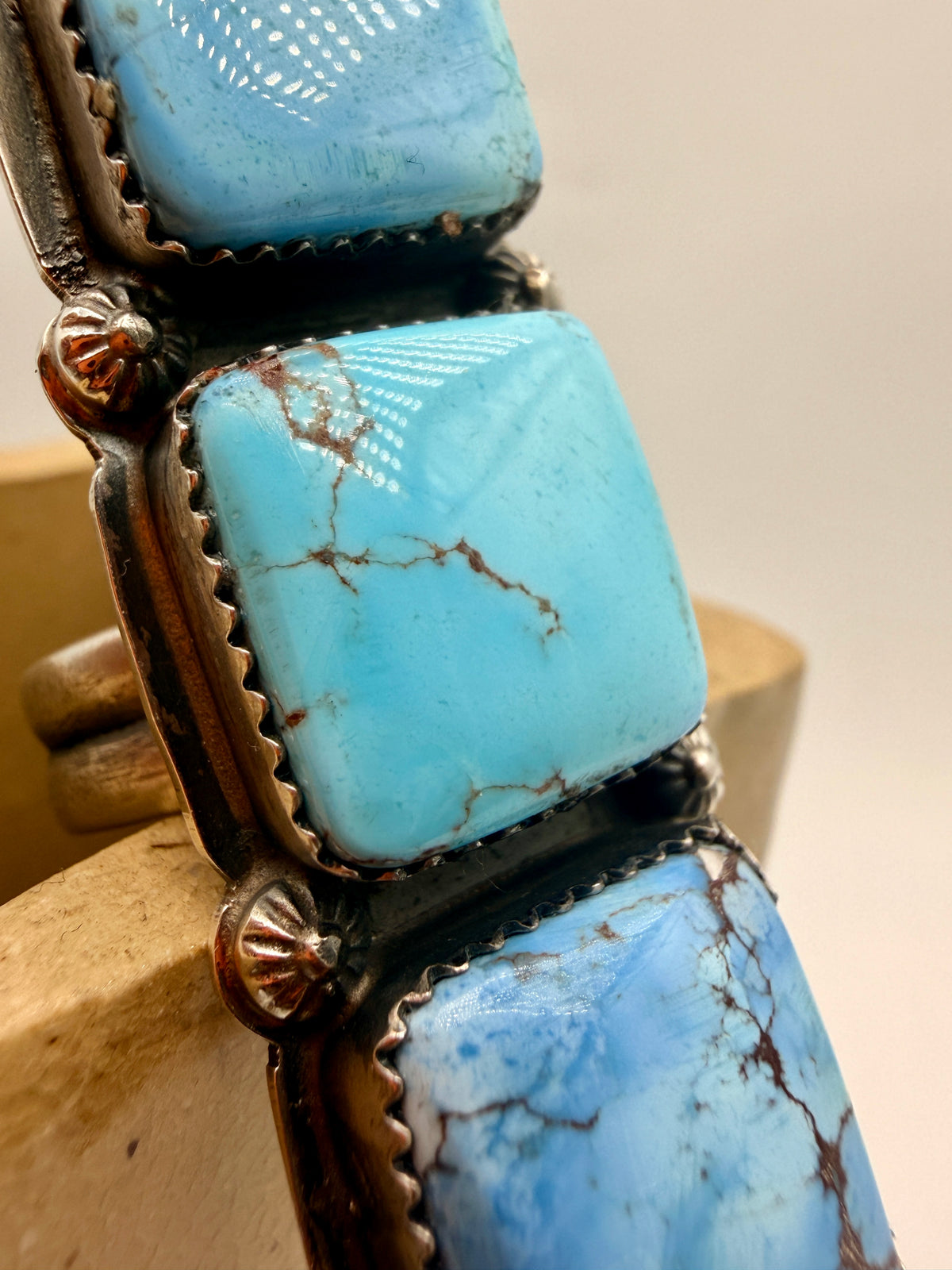 Close-up of pale blue Golden Hills turquoise with fine brown matrix in sterling silver