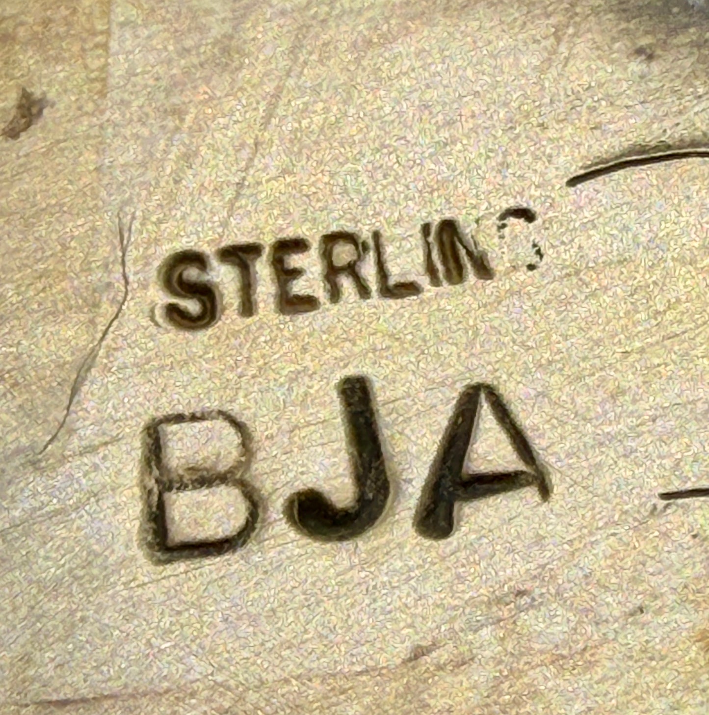 Sterling and BJA artist hallmarks inside the Boyd Ashley turquoise cuff