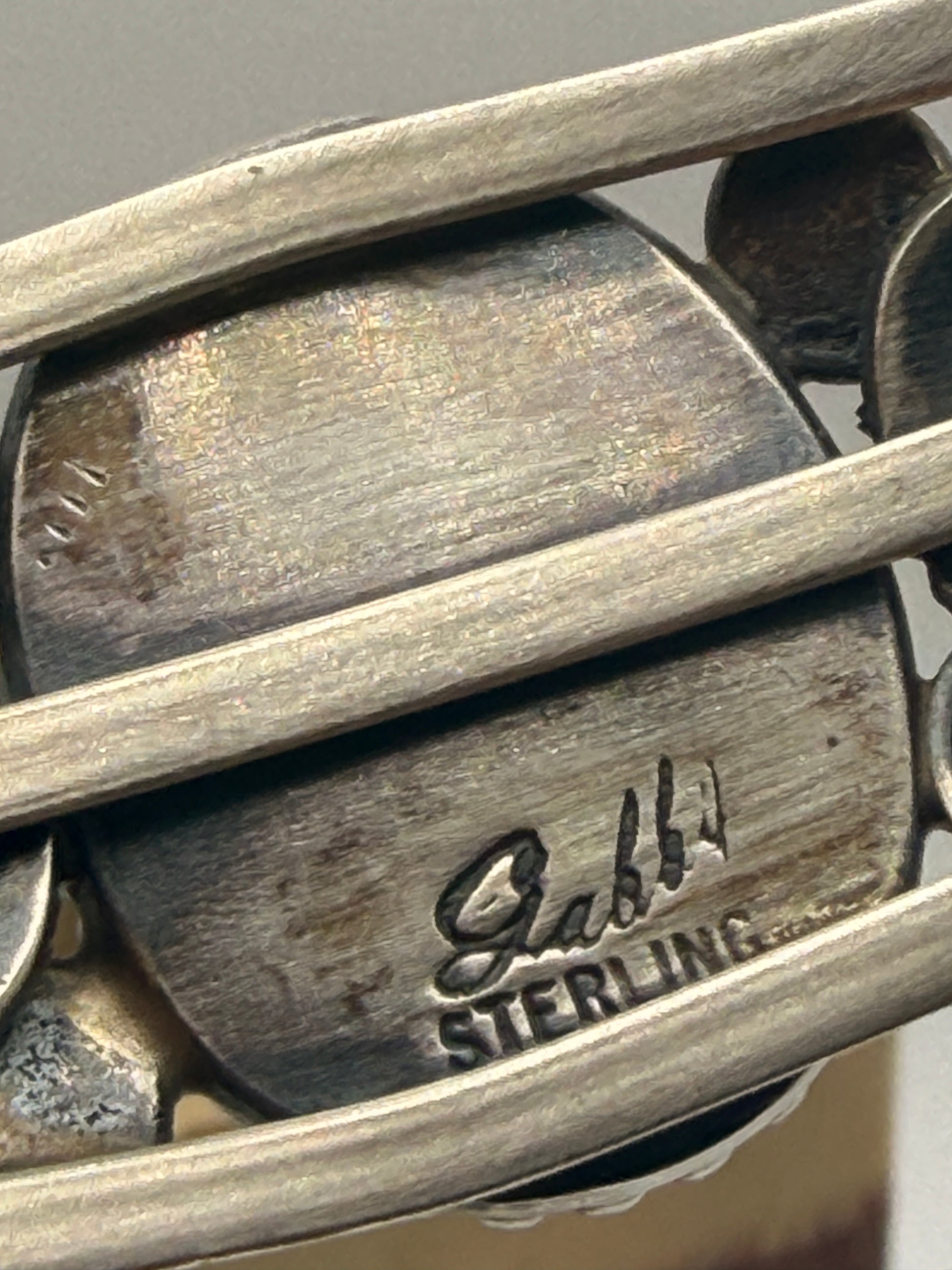 Gabby artist signature and sterling stamp inside turquoise cuff
