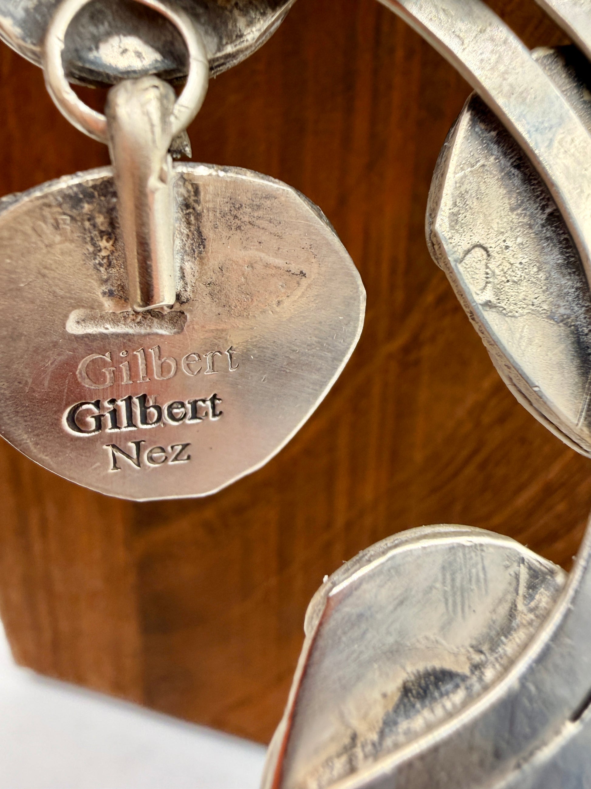 Gilbert Nez artist hallmark on back of squash blossom necklace