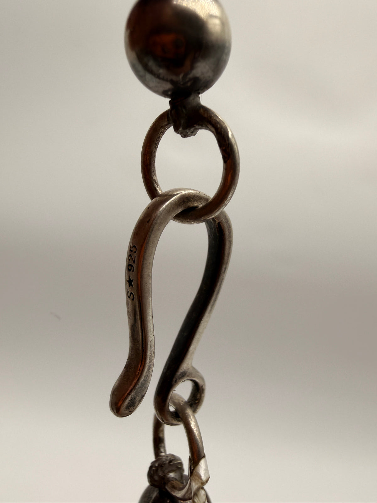 S 925 stamp on sterling silver hook closure of Gilbert Nez necklace