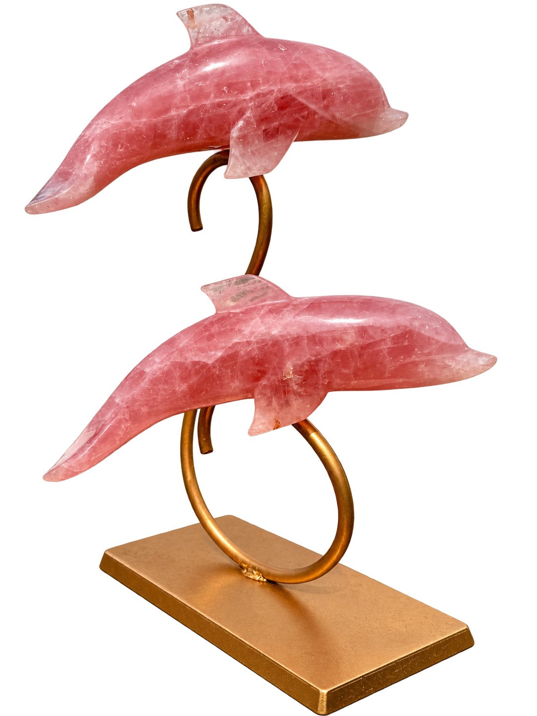 Decorative rose quartz dolphin pair mounted on a curved golden display stand
