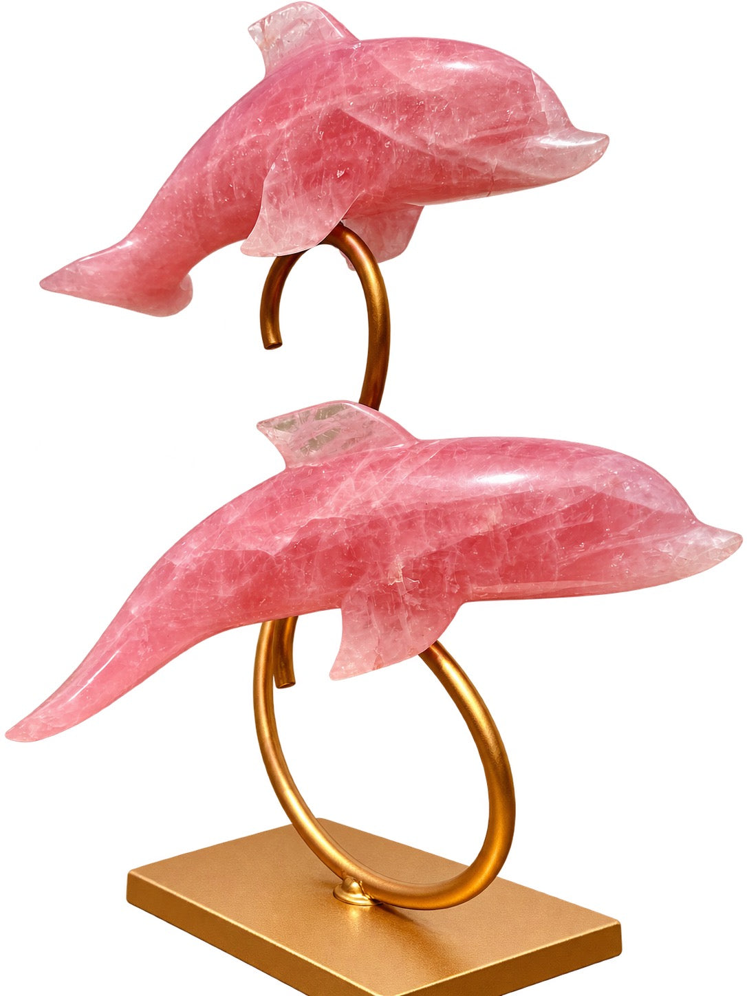 Rose quartz dolphin sculpture with two hand-carved crystal dolphins on a golden metal stand