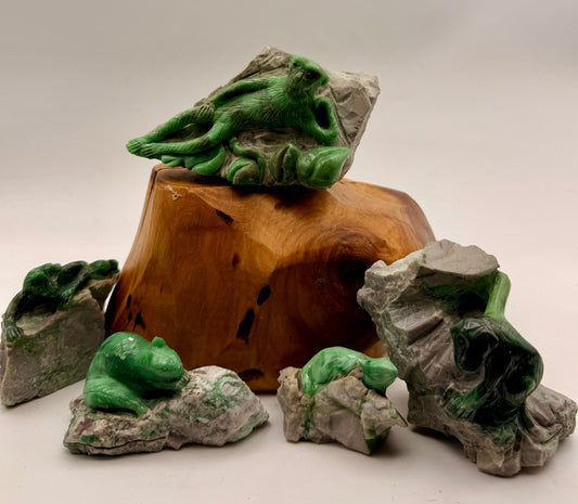 Hand-carved Green Variscite animal sculptures featuring monkeys, bear, and mouse carved from natural stone with original host rock matrix.