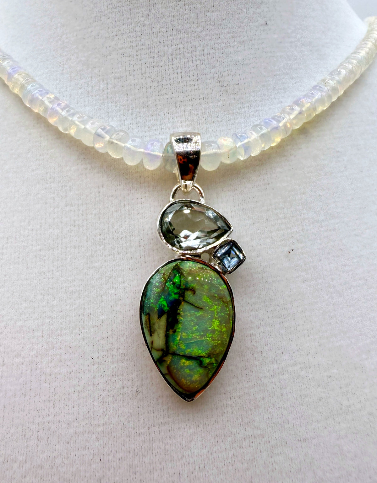 Full view of 26ct Monarch Opal pendant with prasiolite and blue topaz in sterling silver