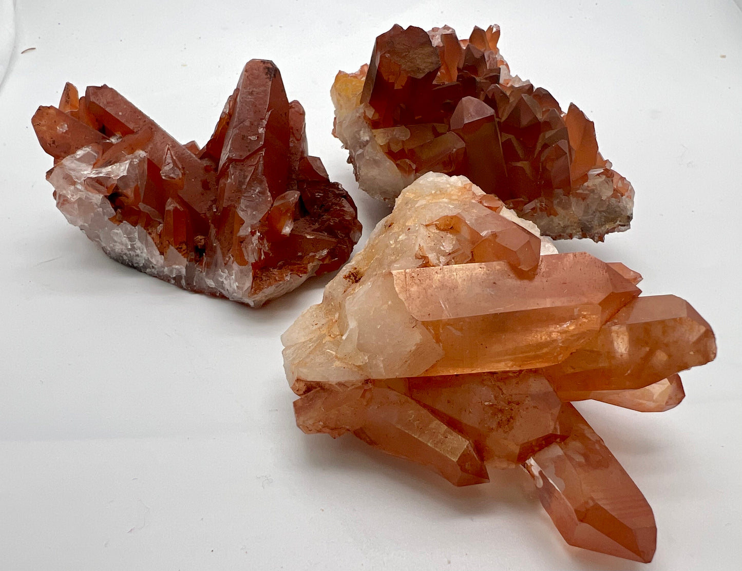 Lemurian Tangerine Quartz clusters