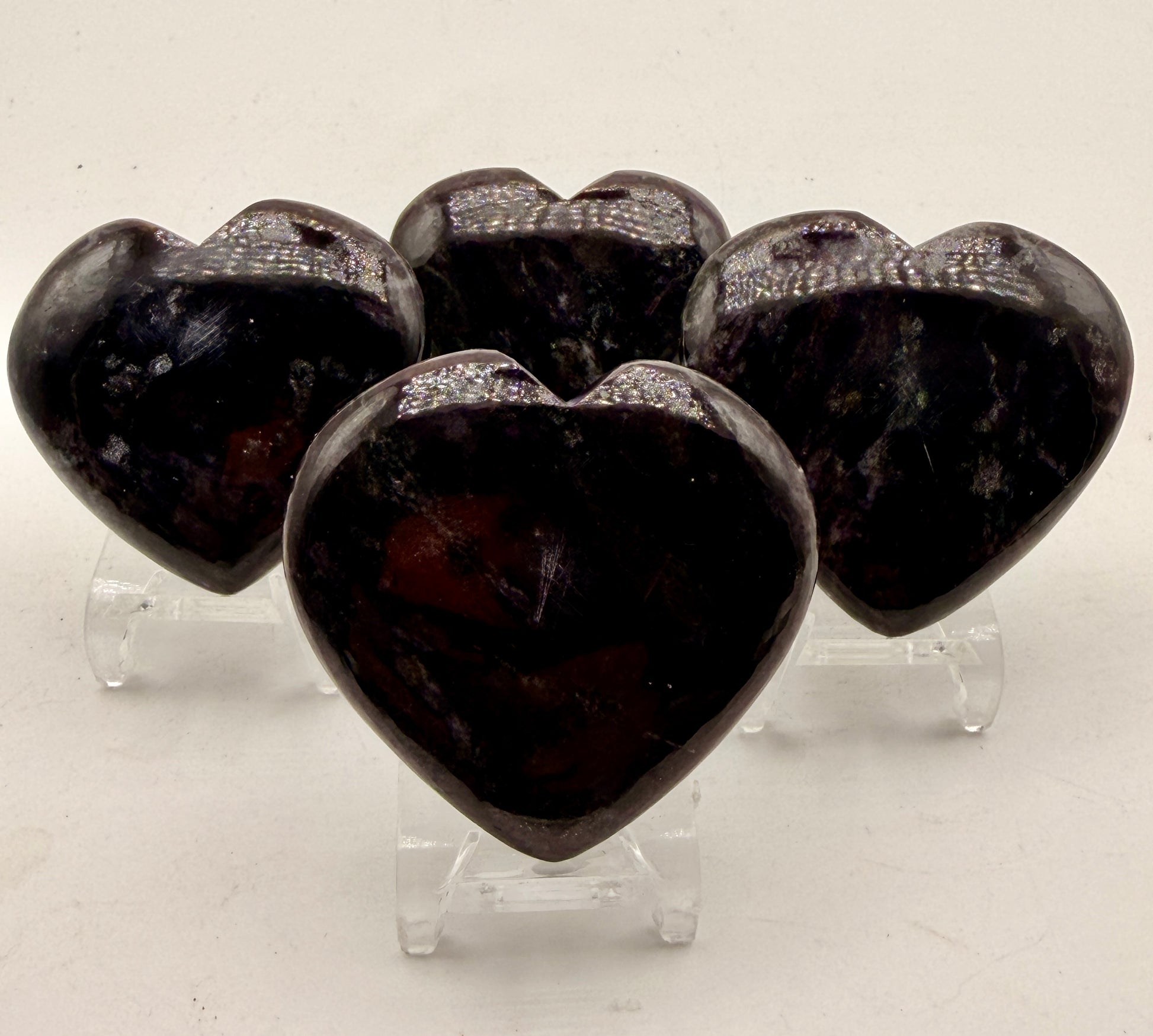 Natural Purple Dumortierite in Quartz crystal heart featuring rich violet inclusions and polished collector-quality finish.