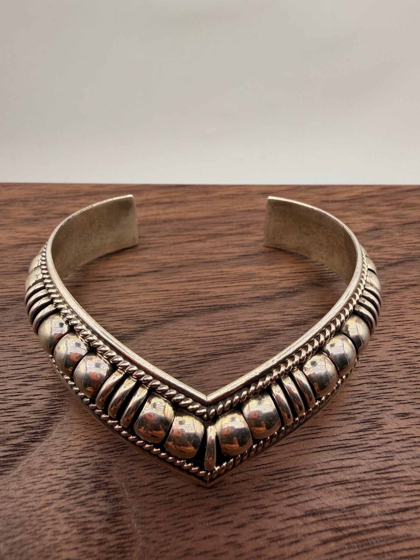 Thomas Charlie handcrafted sterling silver Navajo cuff bracelet with traditional beadwork and twisted rope detailing