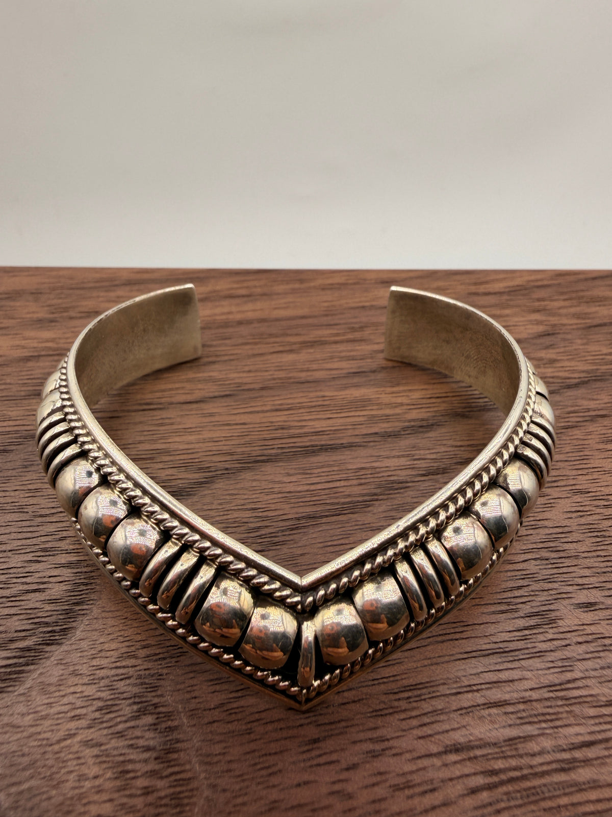 Thomas Charlie handcrafted sterling silver Navajo cuff bracelet with traditional beadwork and twisted rope detailing