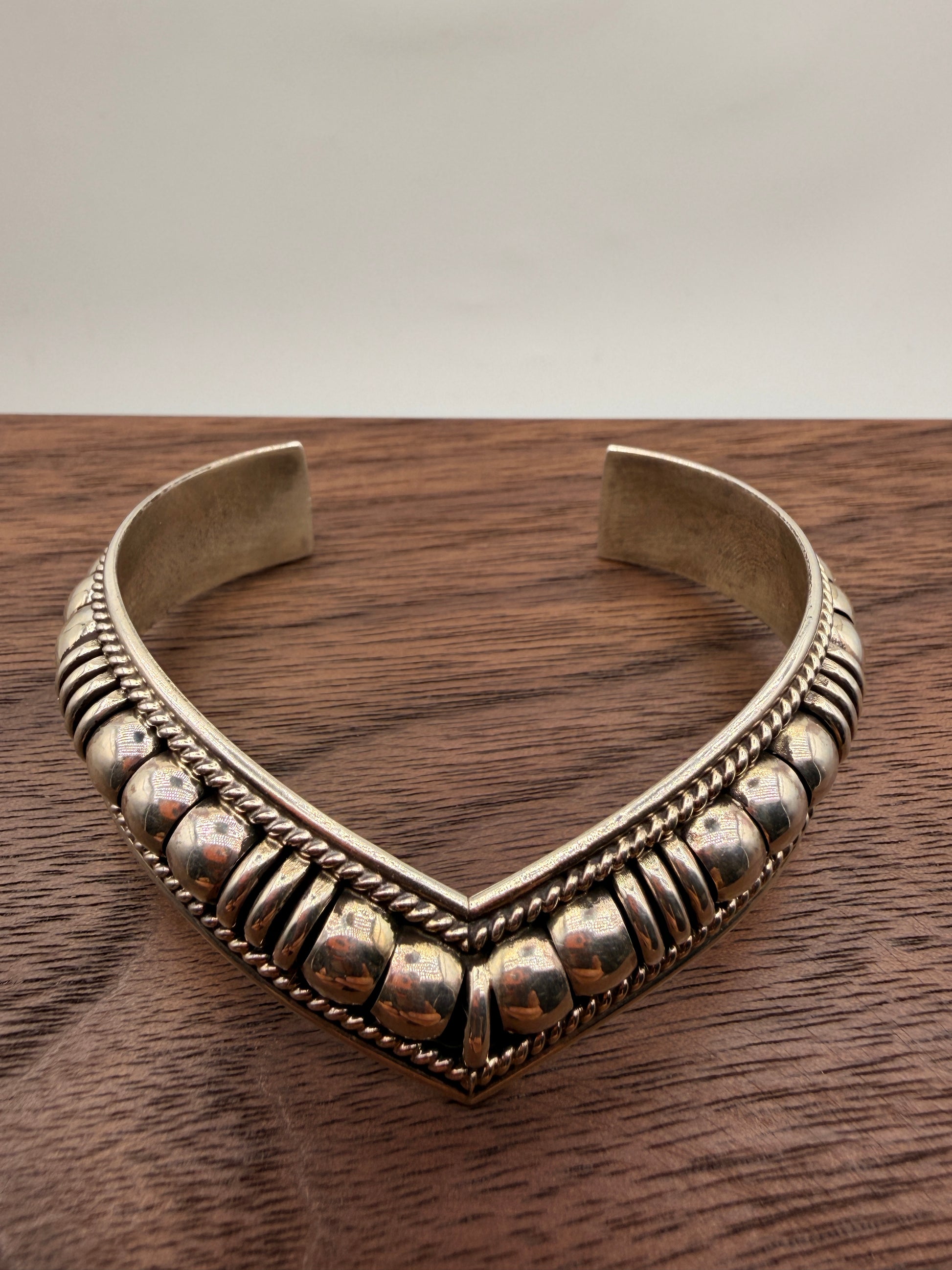 Thomas Charlie handcrafted sterling silver Navajo cuff bracelet with traditional beadwork and twisted rope detailing