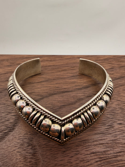 Thomas Charlie handcrafted sterling silver Navajo cuff bracelet with traditional beadwork and twisted rope detailing